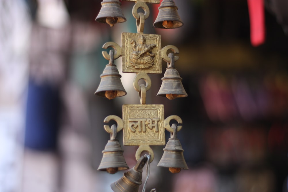 gold and gray bell ornament