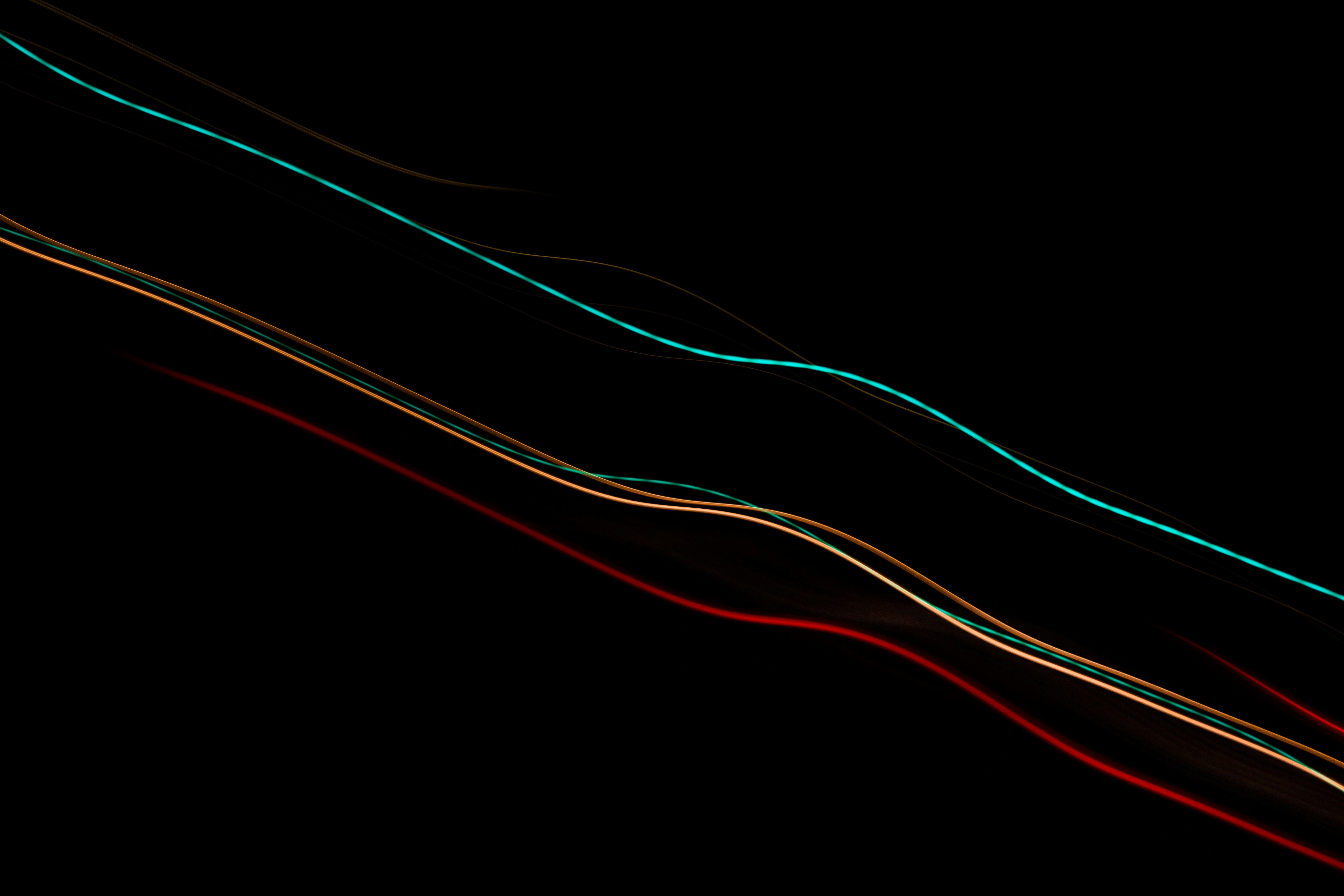 An abstract technological image with glowing blue and white lines of data moving through a dark space, representing the rise of AI and digital disruption.