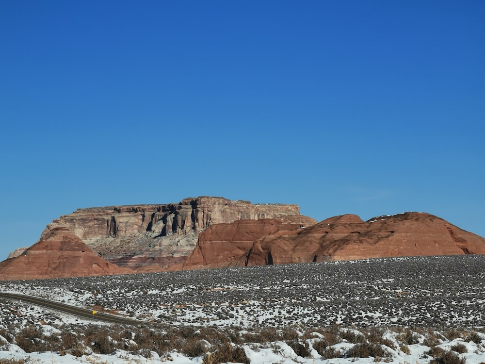 badland under blue sky