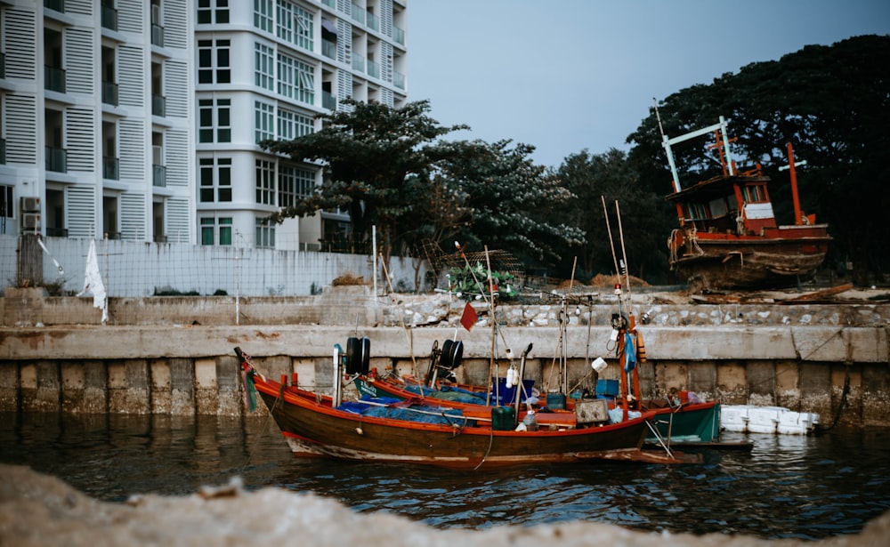 wooden boat docking on pier