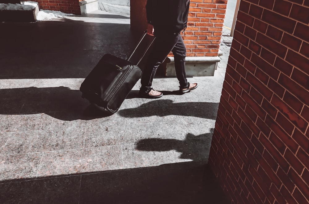 person carrying luggage