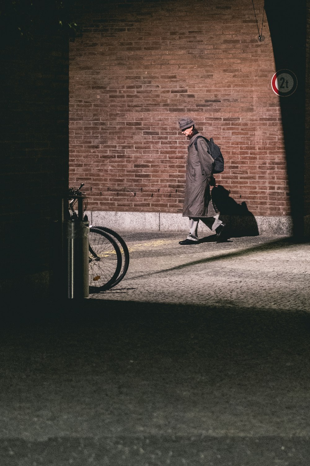 man walking in alley