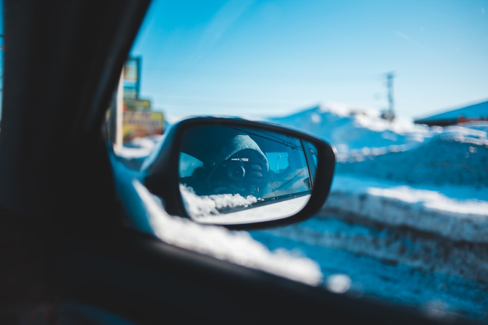 car on snowfield during day