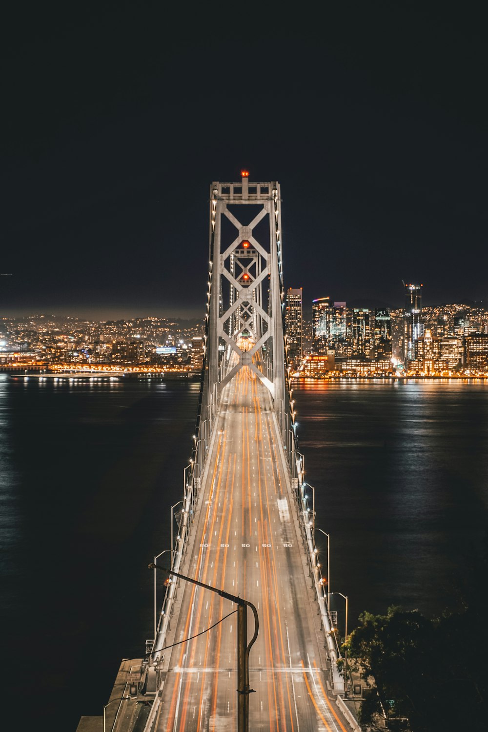 bridge and city during night