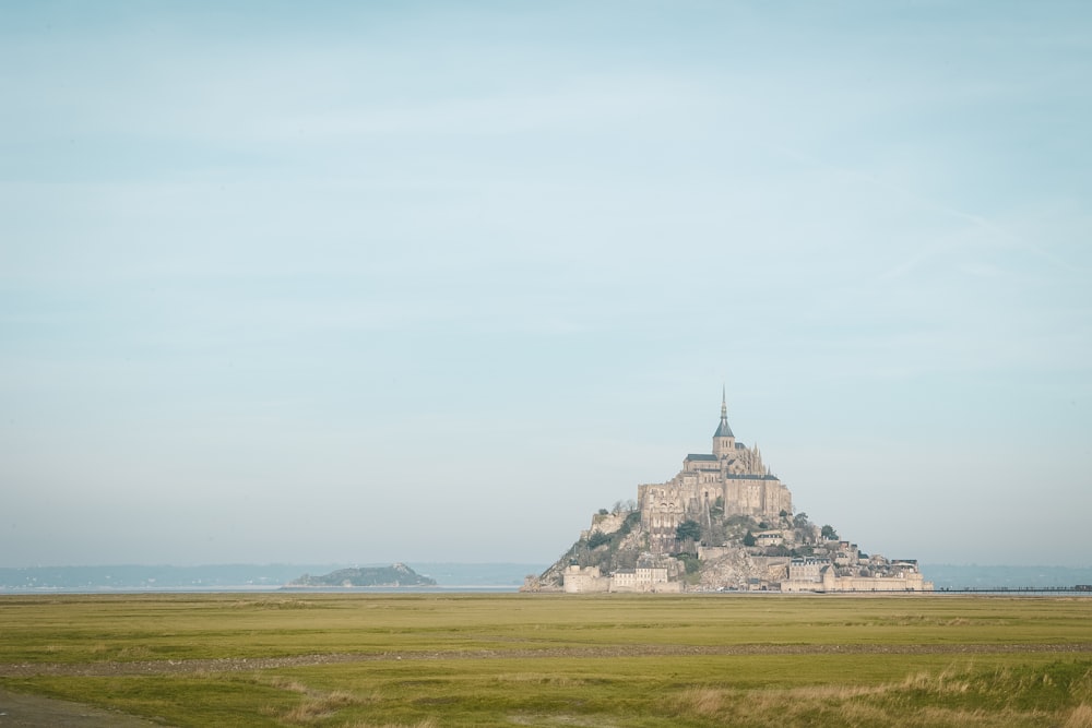 Mont Saint Michel in France under blue and white sky