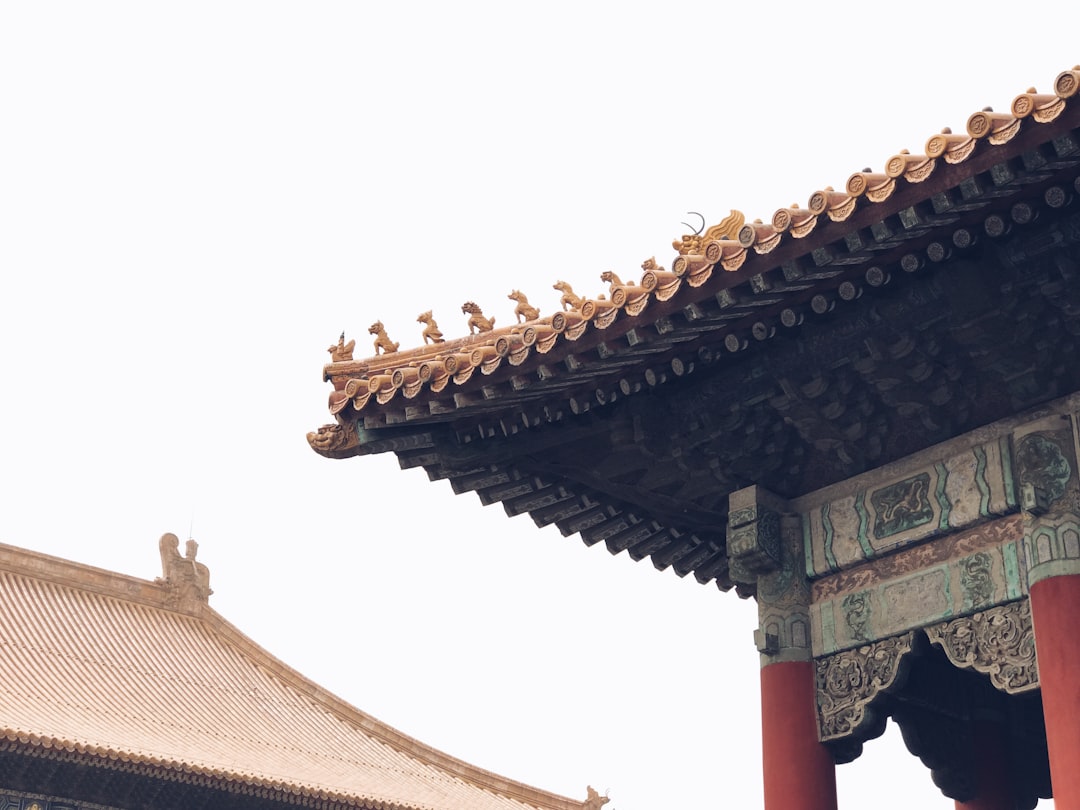 architectural photography of gray and red temple,