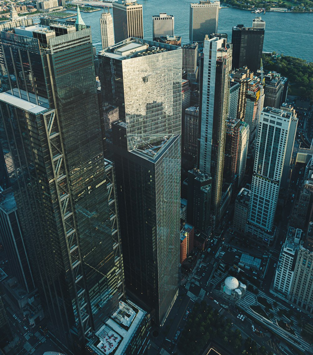 an aerial view of a city with tall buildings