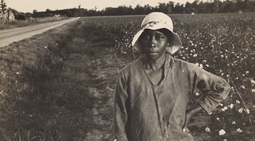 grayscale photography of woman wearing bucket hat