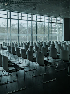 Wide-angle view of a sparkling clean conference room with polished floors.