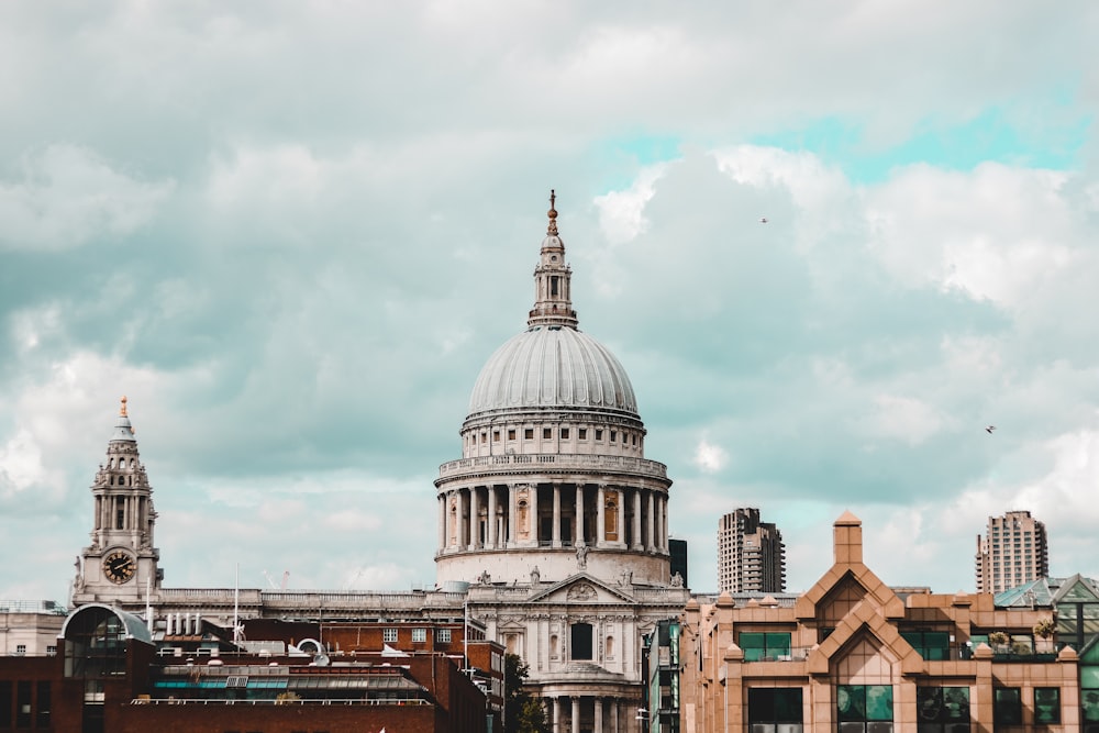 gray concrete dome building under cloudy sky