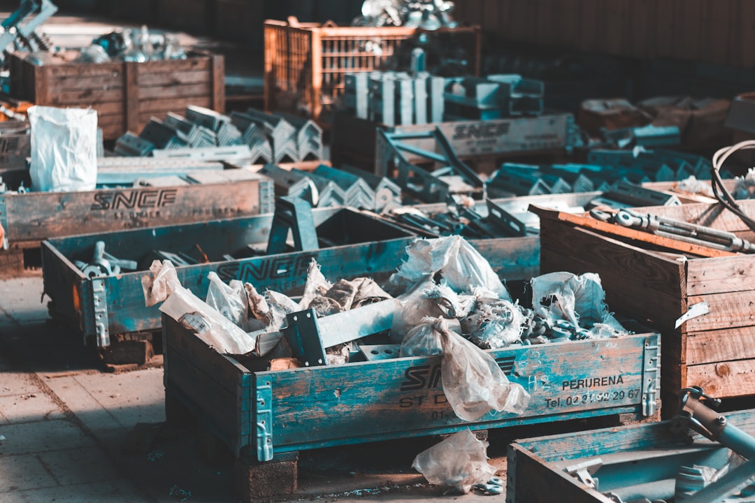 carpentry tools in brown and blue wooden crates