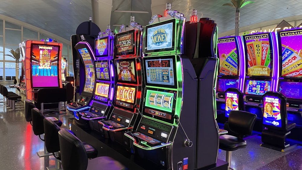 empty chairs in front of arcade machines