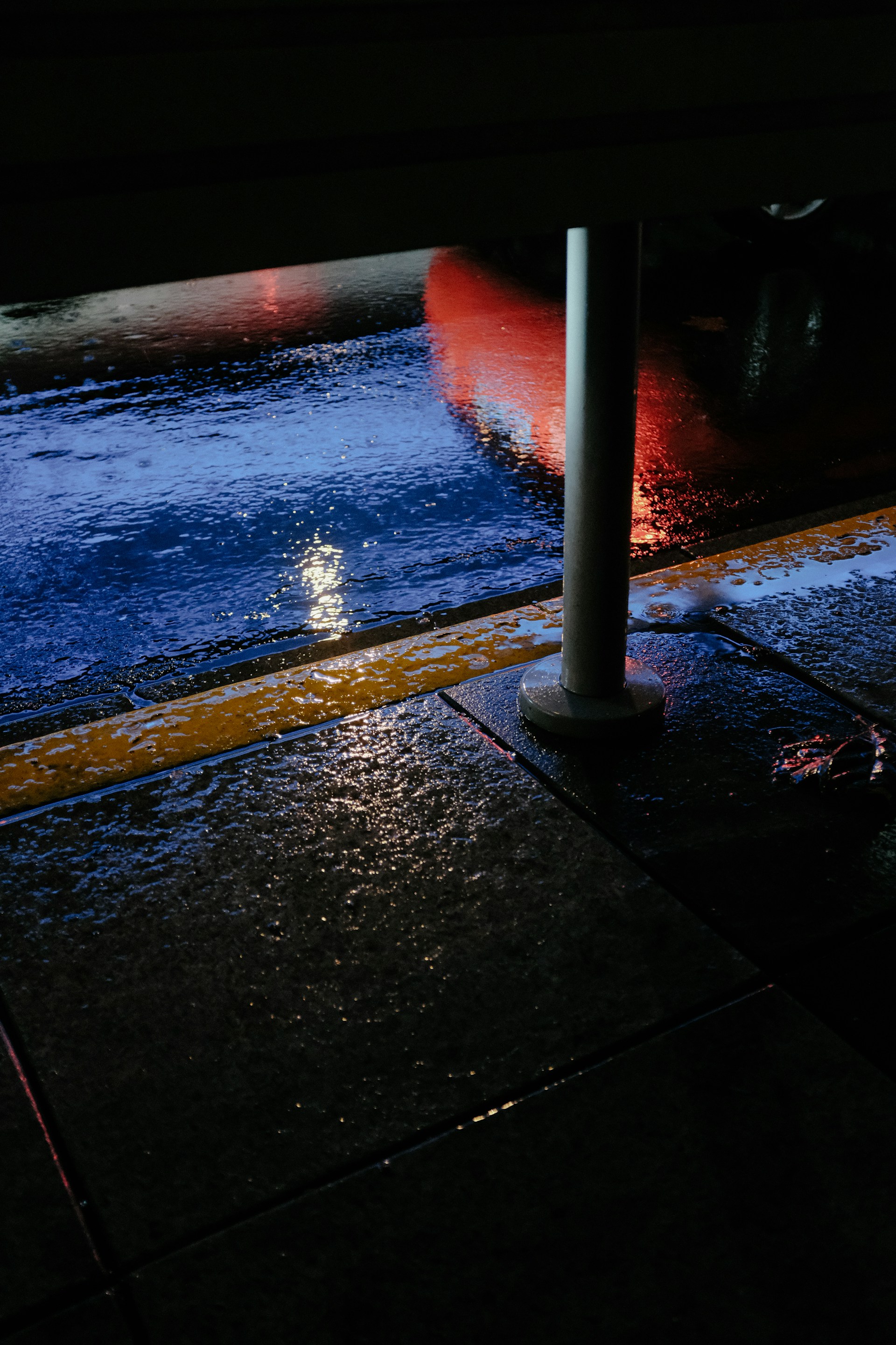 a fire hydrant sitting on the side of a road