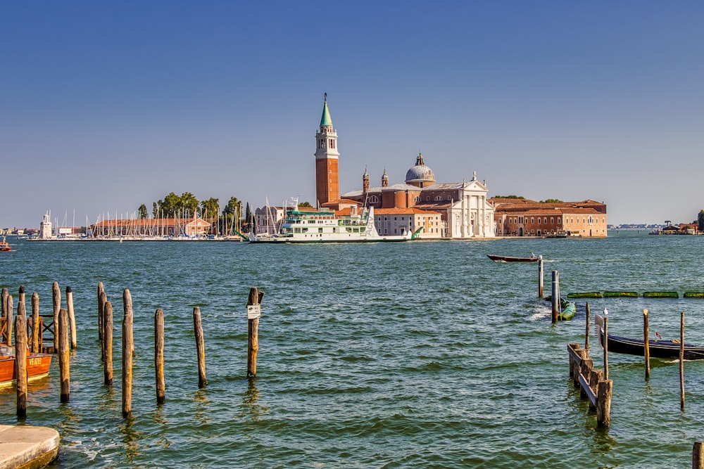 a large body of water with a city in the background