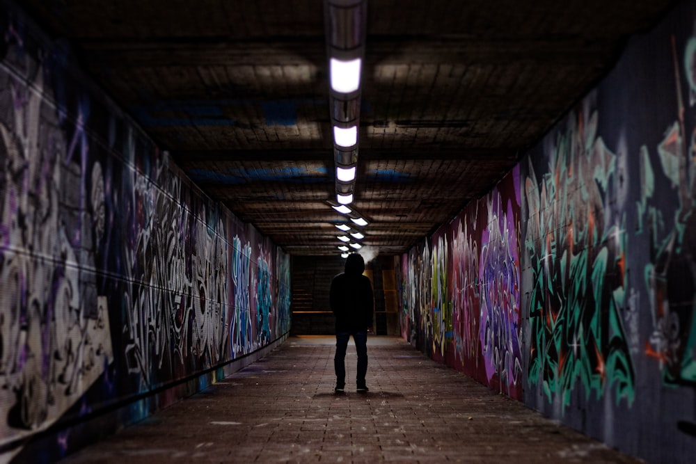 man standing in subway