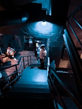 An industrial-chic event space decorated with ambient lighting and stylish seating.