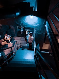 An industrial-chic event space decorated with ambient lighting and stylish seating.