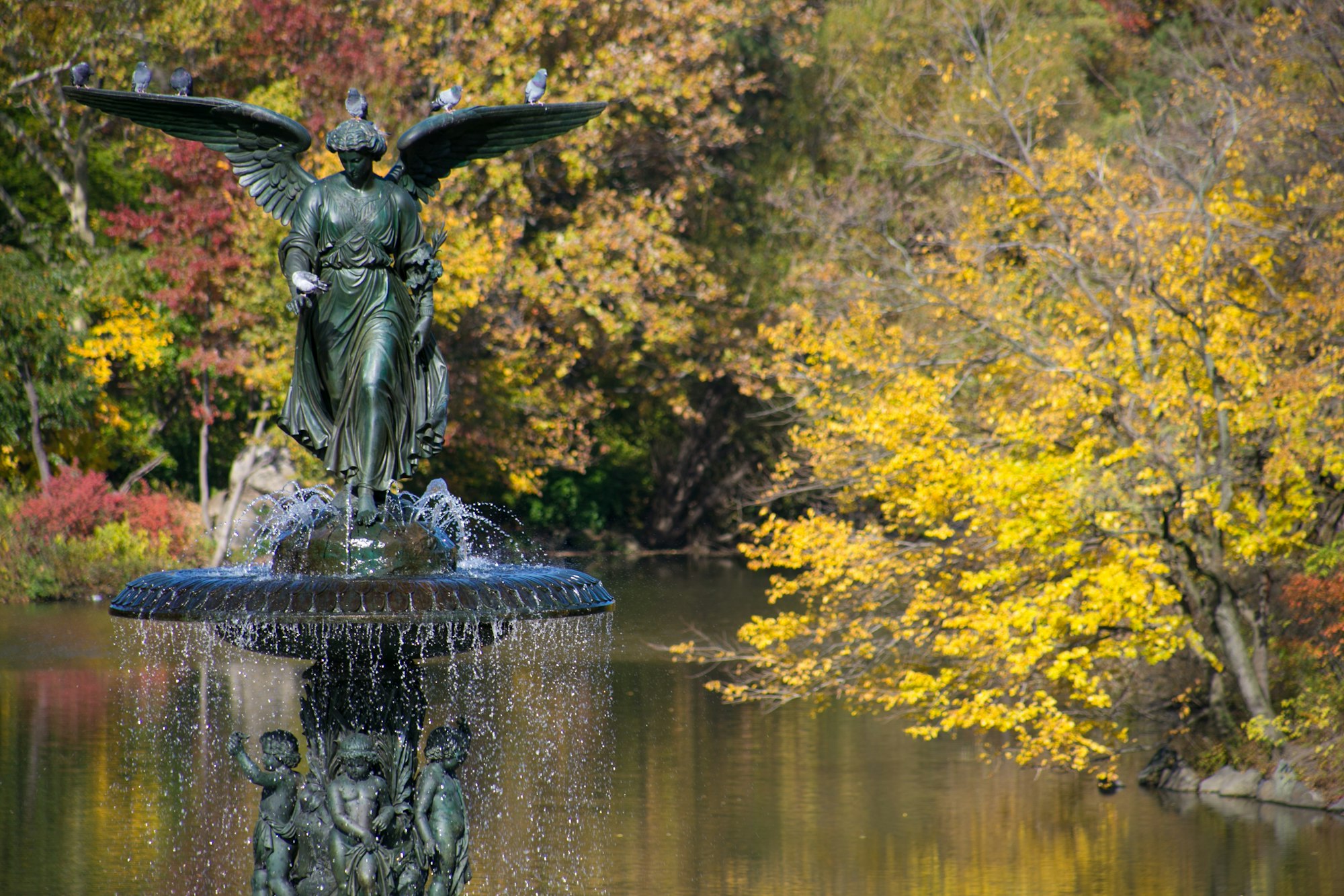 Bethesda Terrace and Fountain are two architectural features overlooking The Lake in New York City's Central Park. The fountain, with its Angel of the Waters statue, is located in the center of the terrace.