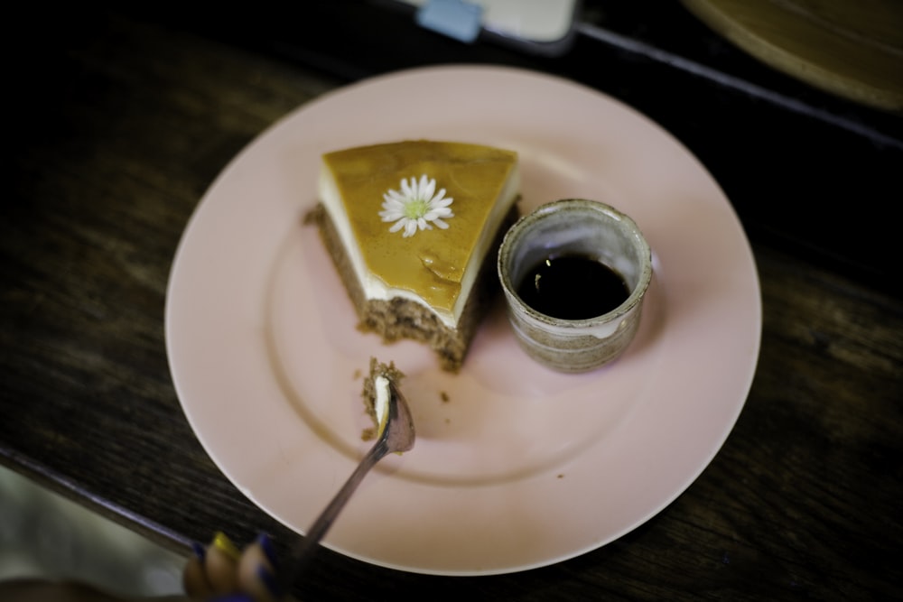 white ceramic cup and pie on plate