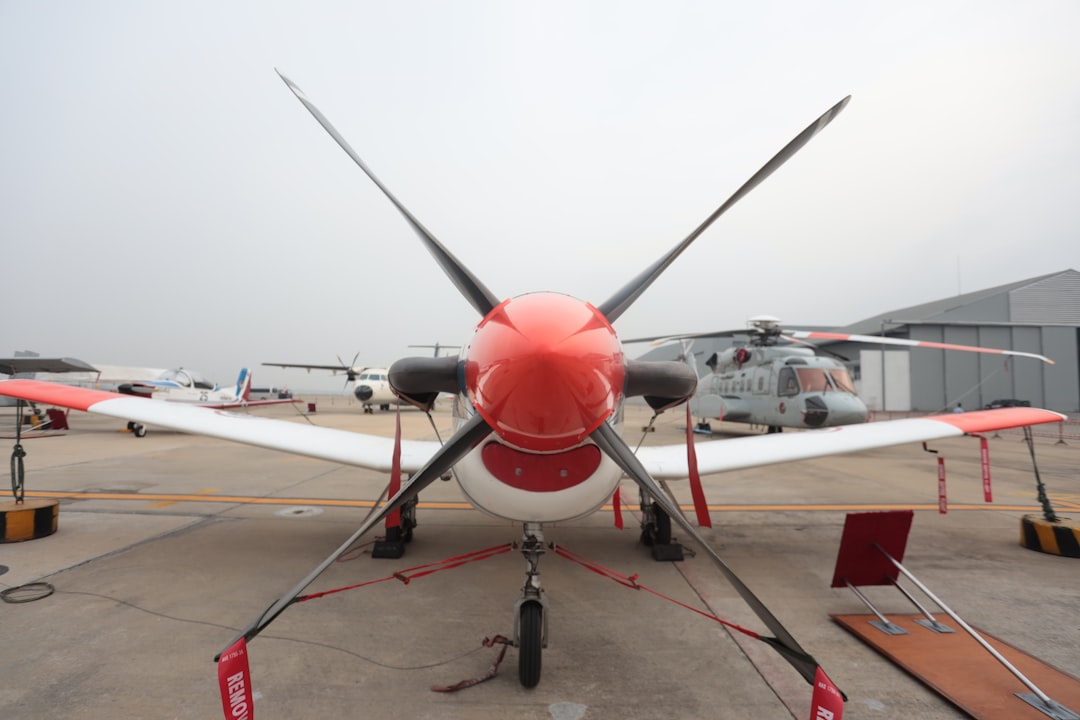red and white aircraft