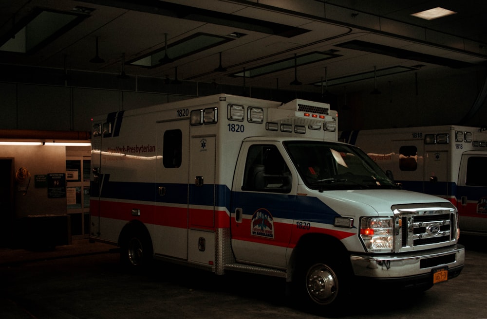 white Ambulance parked in garage
