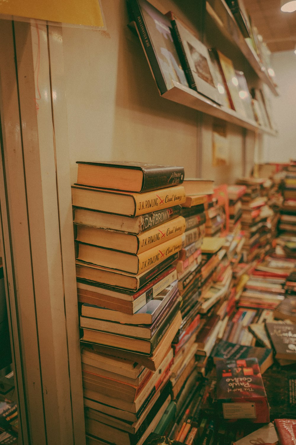 piled of books in room