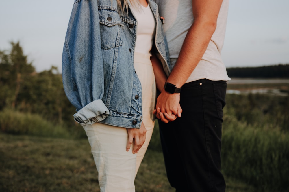 couple in grass field