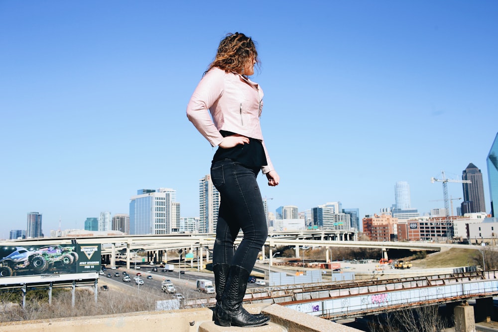 woman standing on high blobk