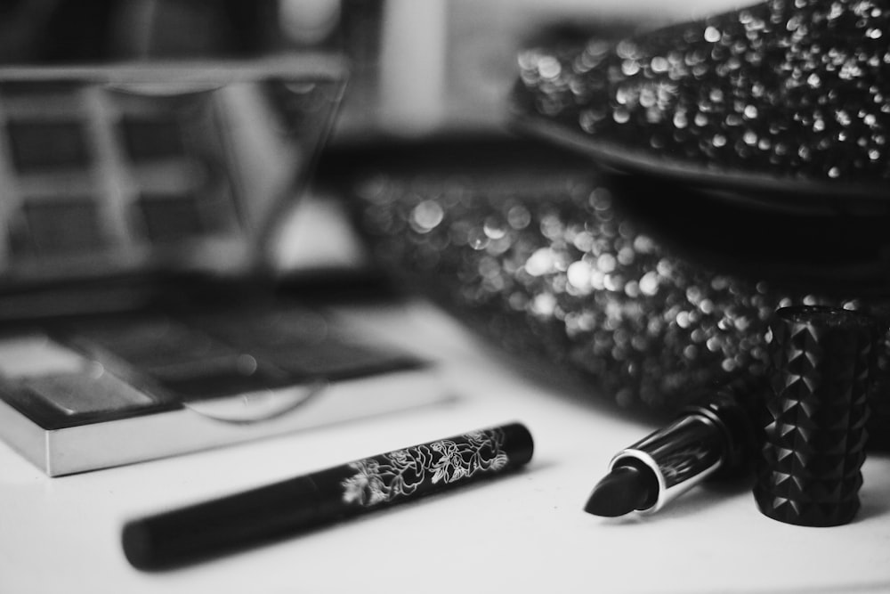 grayscale photography of lipstick