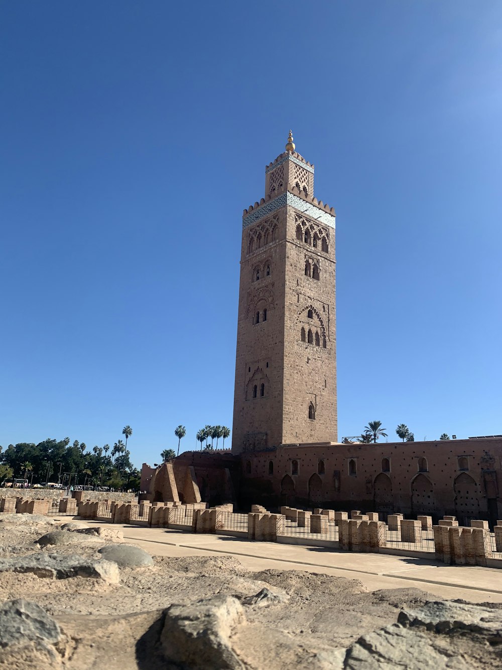 a tall tower with a clock on the top of it