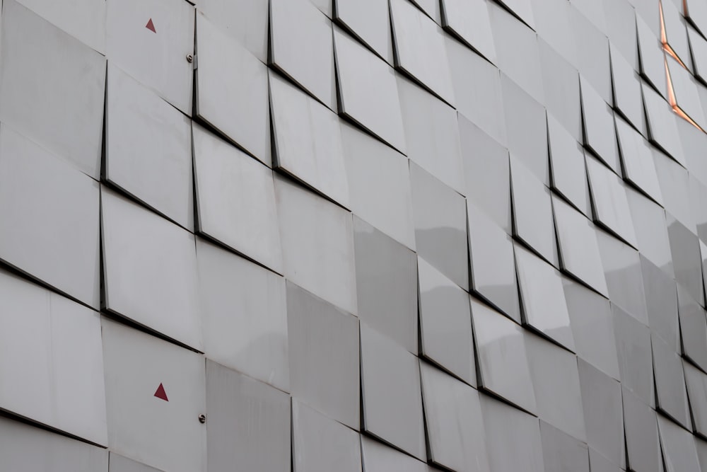 a close up of a wall made of squares and rectangles