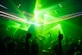 people dancing inside room with green lights