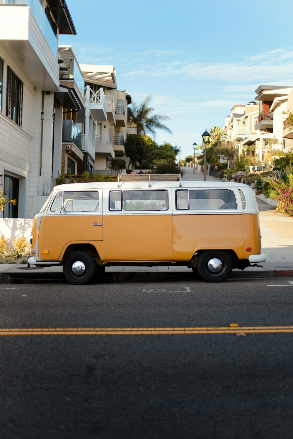 orange and white Volkwagen T1 vehicle