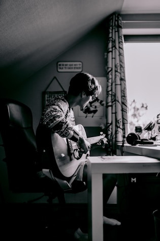 man playing guitar