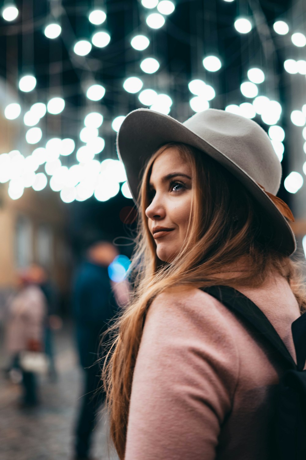 woman in gray hat