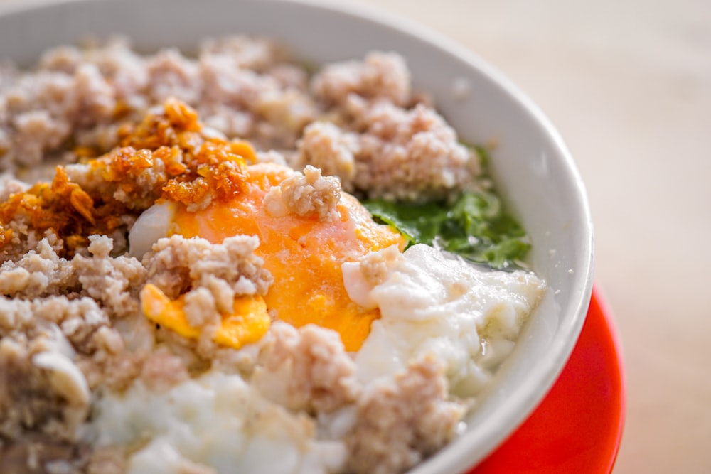 bowl of food on red surface