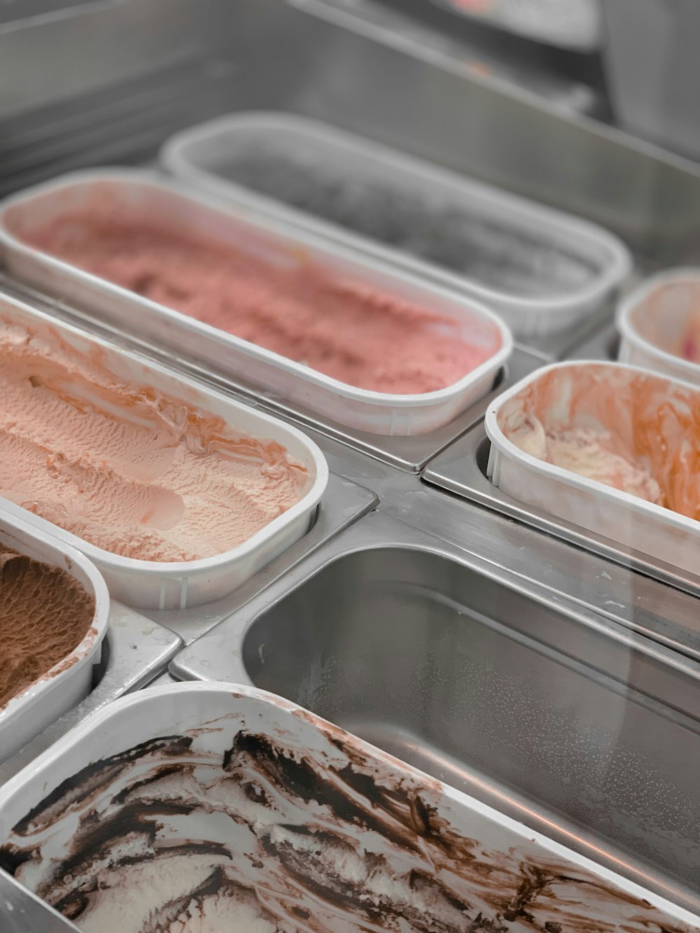 boxes of ice cream on display case