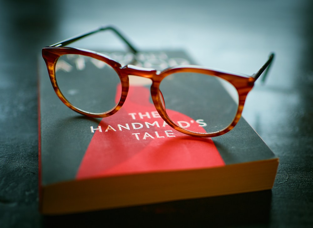 eyeglasses on book