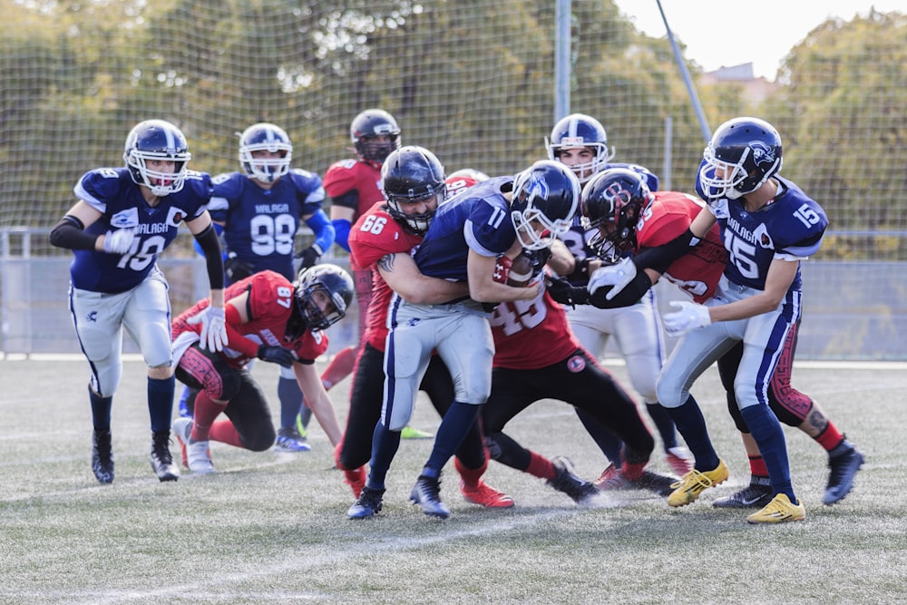 two teams playing football during daytime