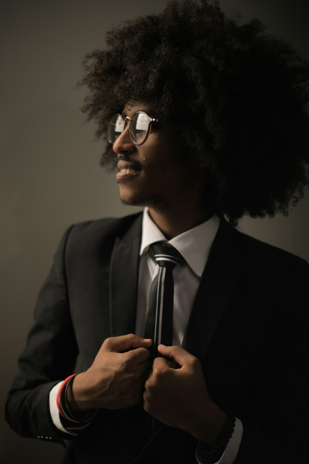 selective focus photography of man in black suit