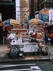 Stacks of Sabrett hotdog packages displayed in a local grocery store.
