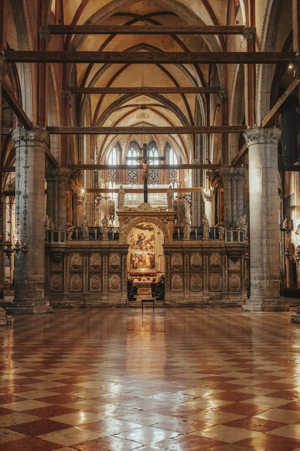 a large cathedral with a cross on the alter