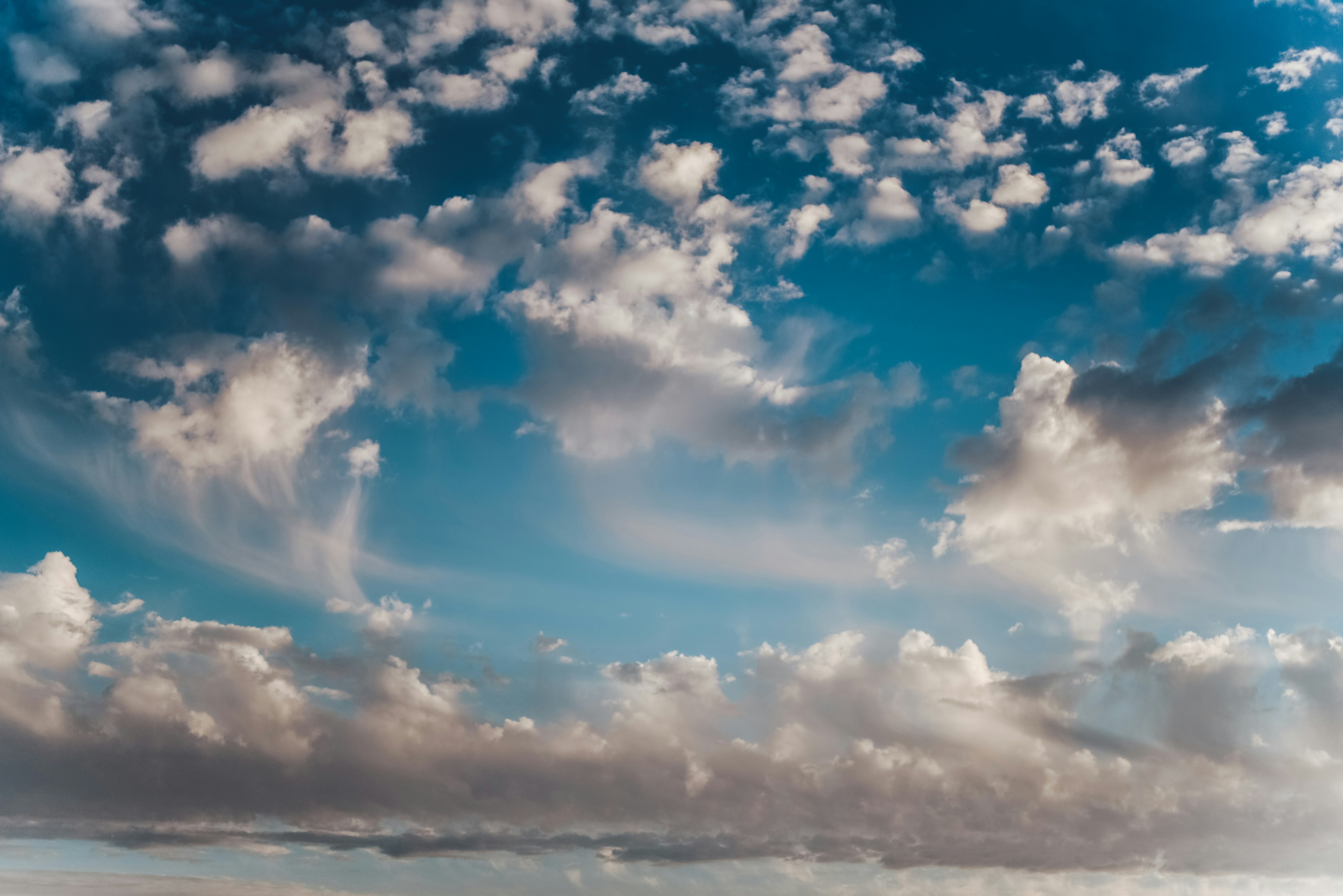 white clouds under blue sky