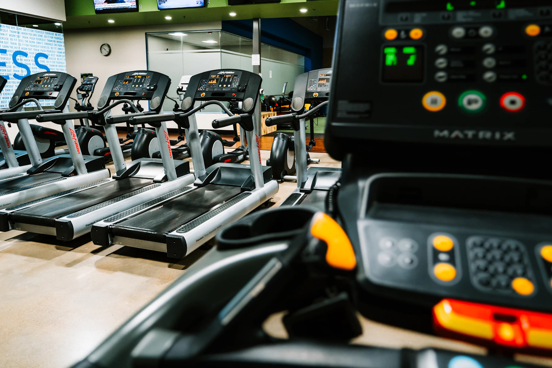 Row of treadmills in a gym