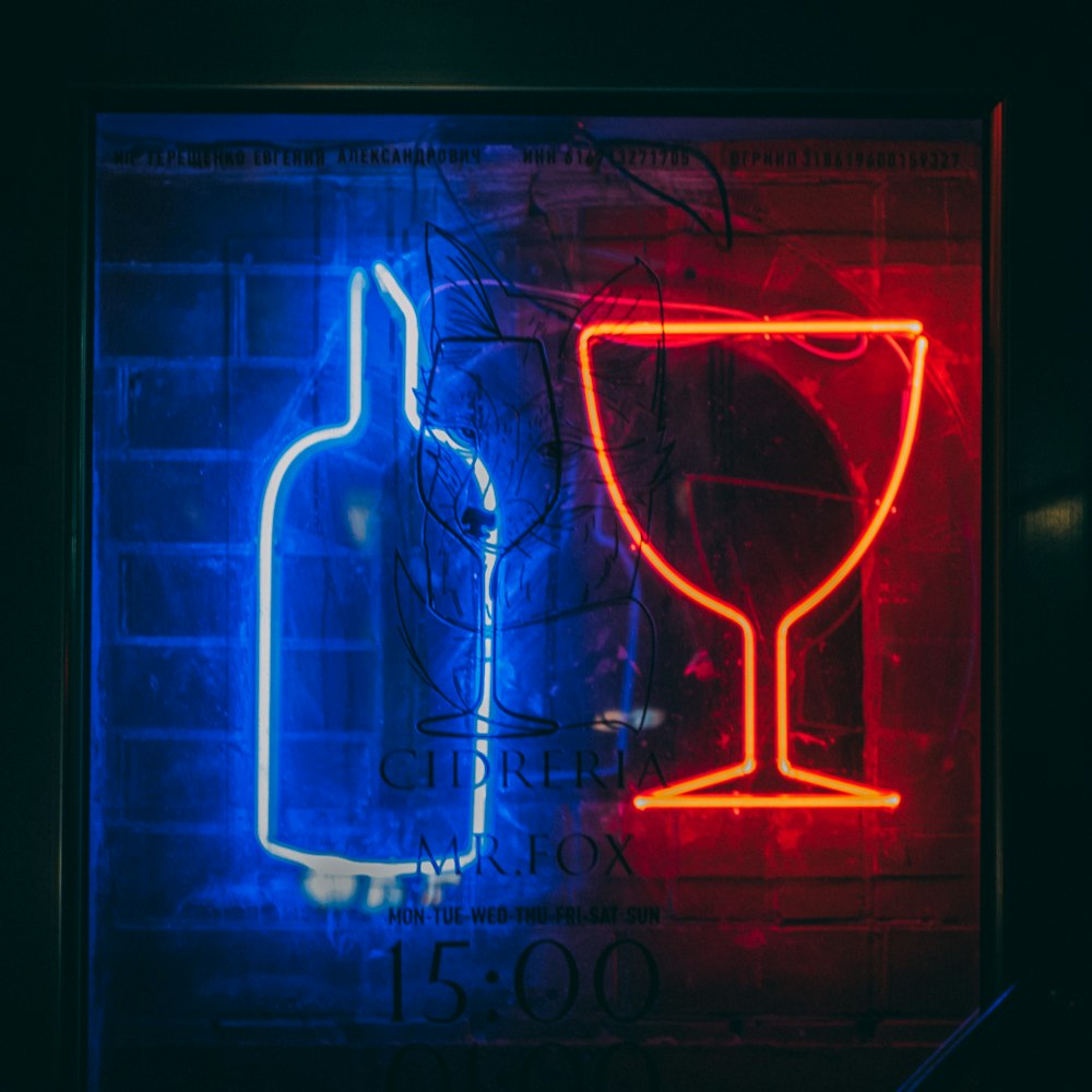 red and blue wine bottle and glass neonlight