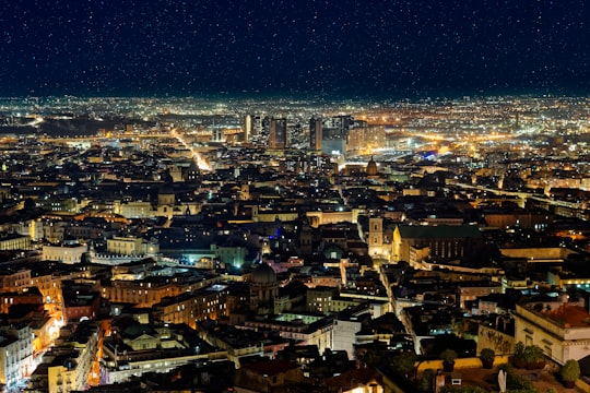 high-angle photography of city buildings during nighttime in Metropolitan City of Naples Italy