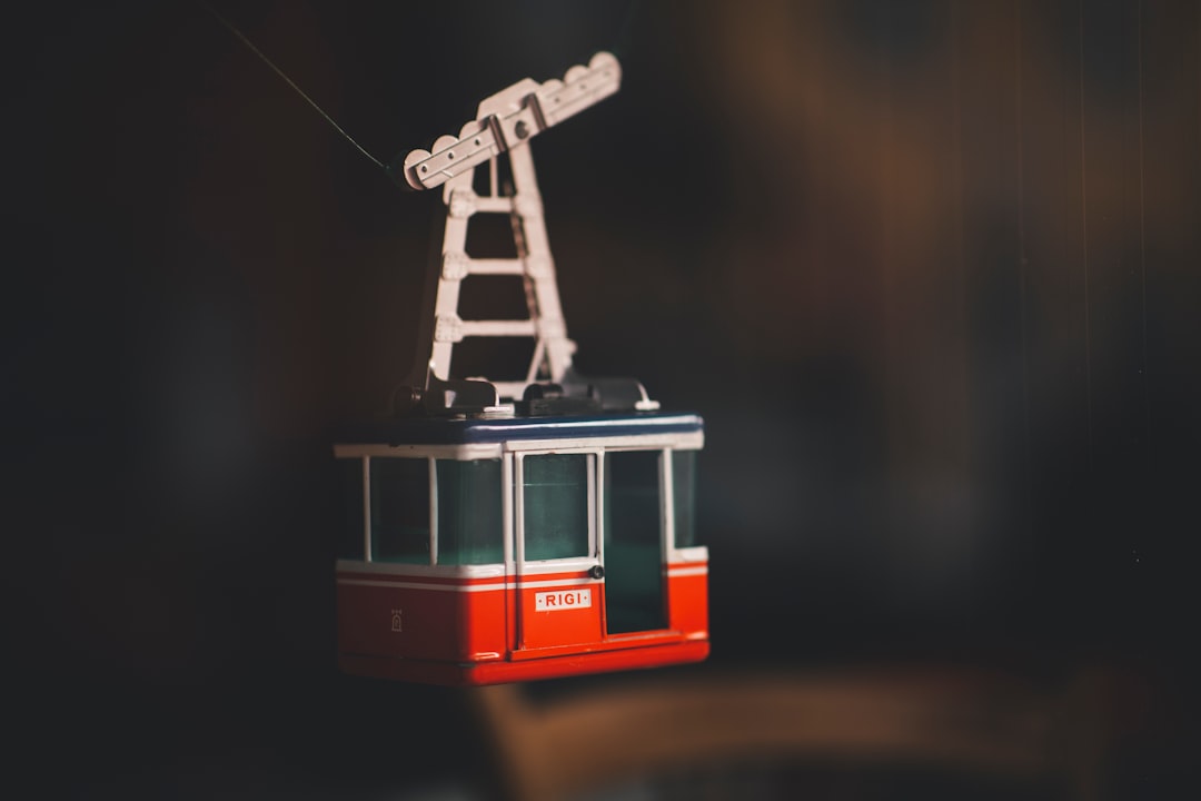 red and white cable cart scale model