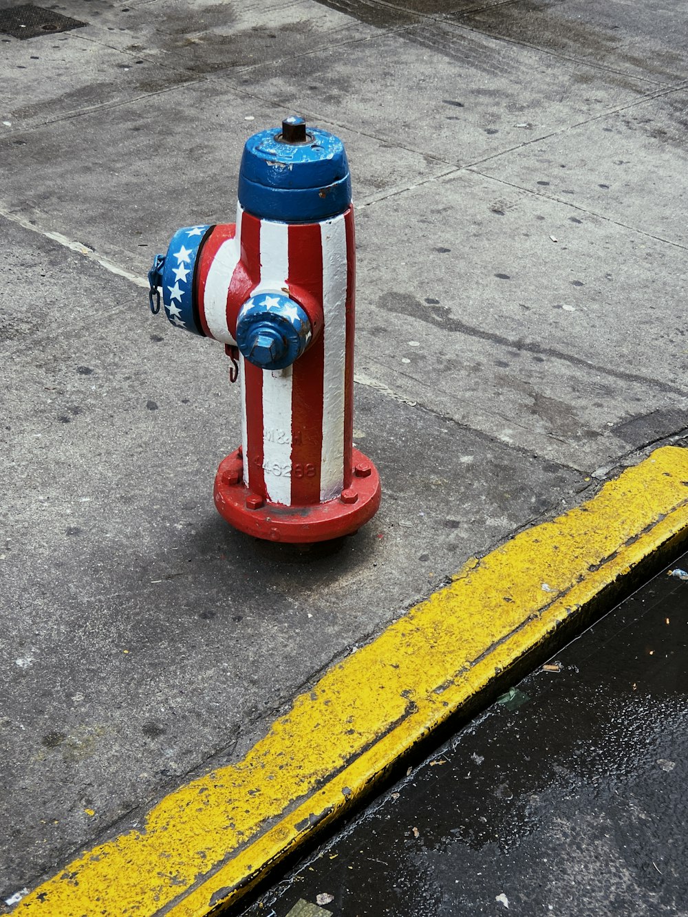 red, white, and blue fire hydrant