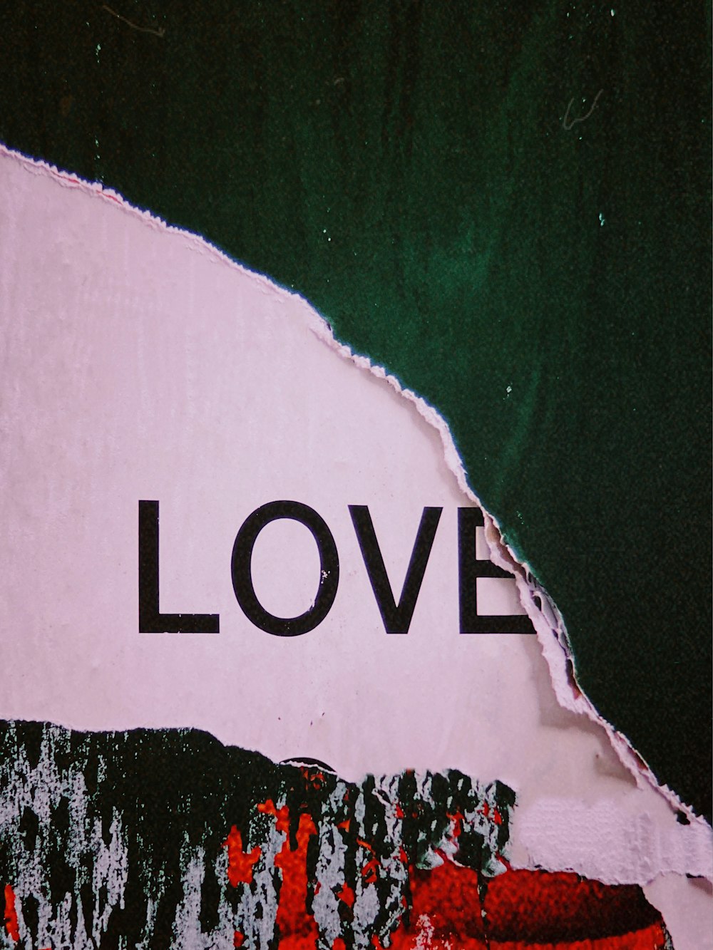 love text under green and red paper