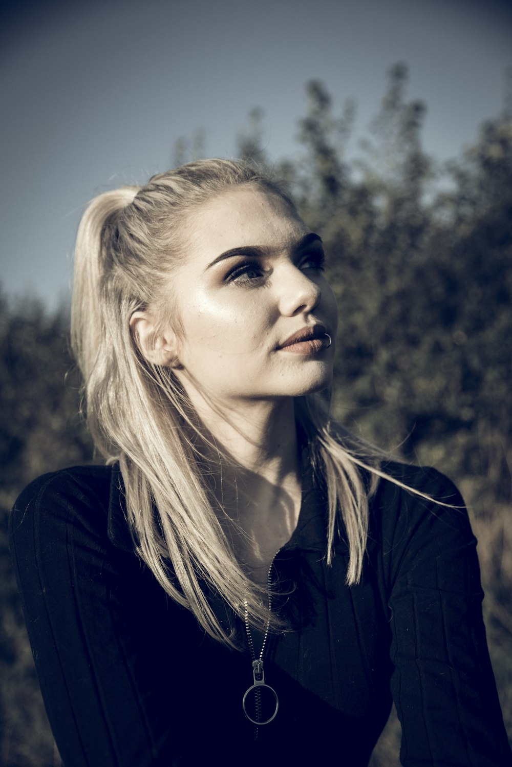 selective focus photography of woman wearing black shirt during daytime